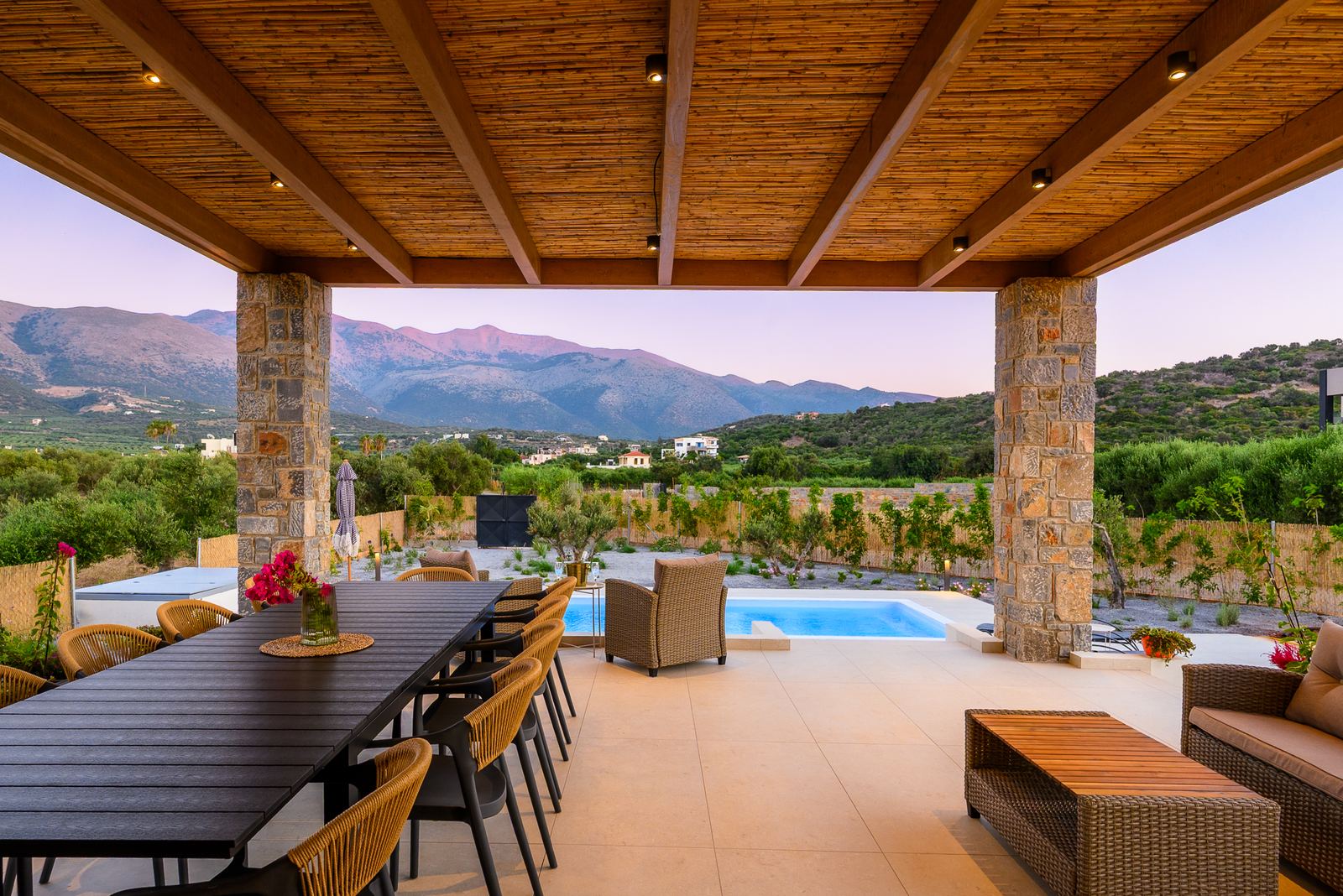 Pergola with mountain view at dusk